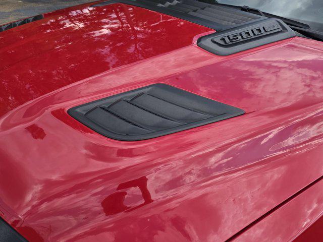 Photo of 2025 Flame Red Clearcoat RAM 1500