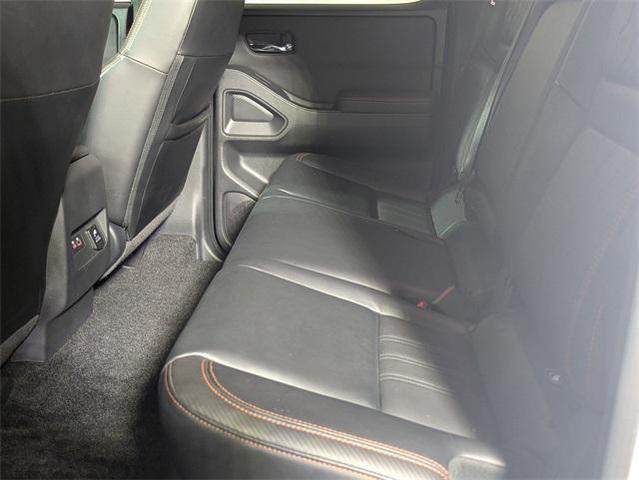 Photo of 2023 Glacier White Nissan Frontier