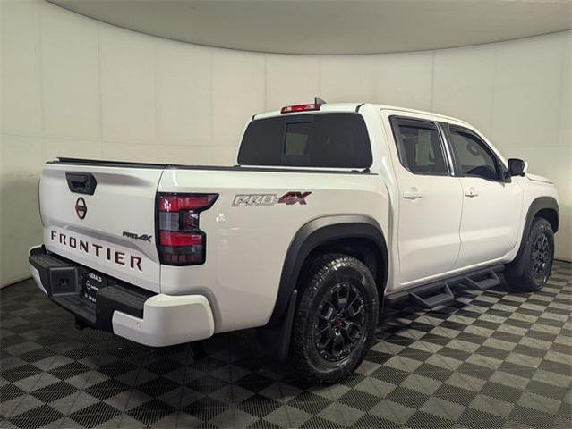 Photo of 2023 Glacier White Nissan Frontier
