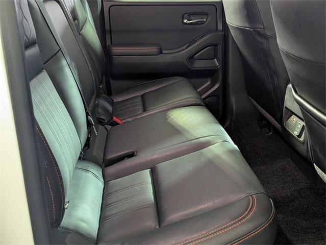 Photo of 2023 Glacier White Nissan Frontier