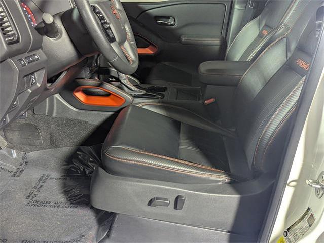 Photo of 2023 Glacier White Nissan Frontier