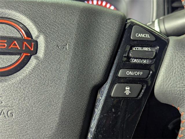 Photo of 2023 Glacier White Nissan Frontier