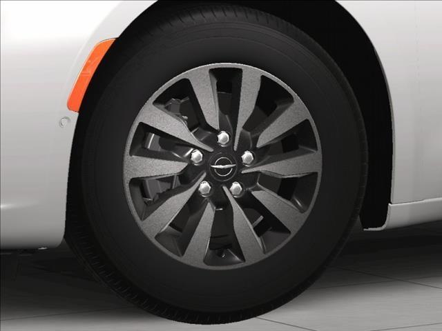 Photo of 2025 Bright White Clearcoat Chrysler Pacifica Hybrid