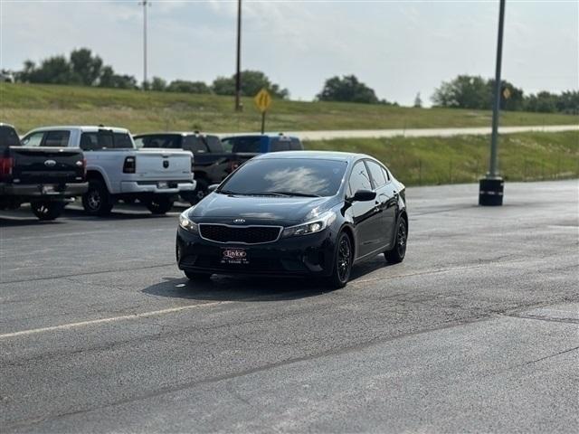 Photo of 2017 Aurora Black Pearl Kia Forte