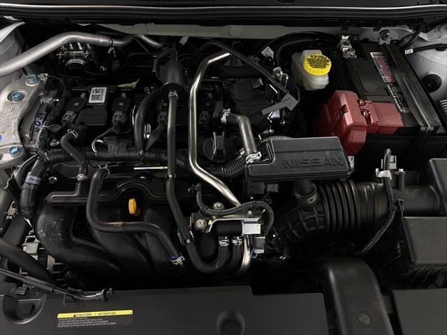 Photo of 2025 Aspen White Tricoat/Super Black Nissan Sentra