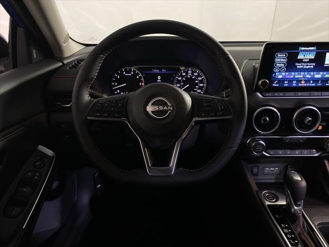 Photo of 2025 Aspen White Tricoat/Super Black Nissan Sentra