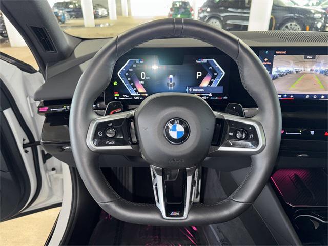 Photo of 2025 White Metallic BMW 530