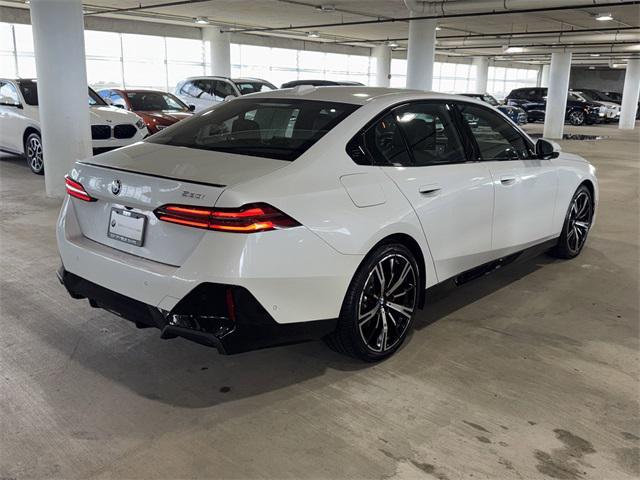 Photo of 2025 White Metallic BMW 530