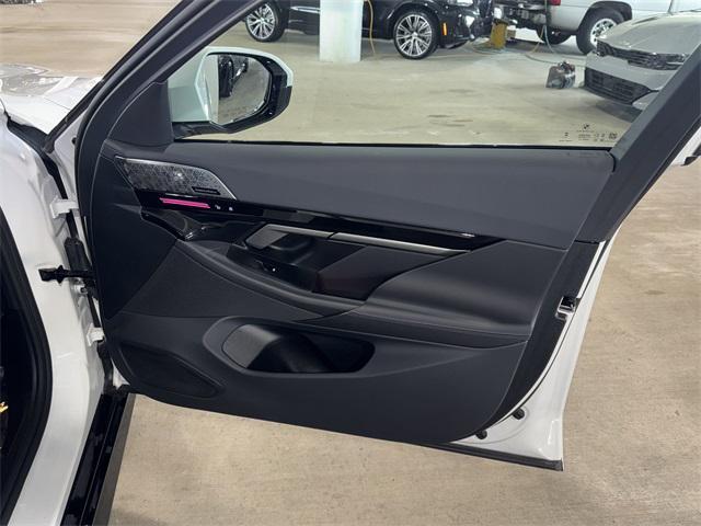 Photo of 2025 White Metallic BMW 530