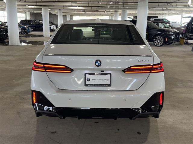 Photo of 2025 White Metallic BMW 530