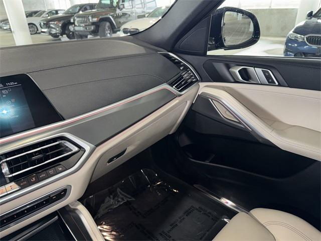 Photo of 2022 Black Sapphire Metallic BMW X6