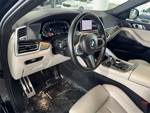 Photo of 2022 Black Sapphire Metallic BMW X6