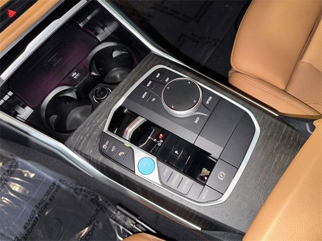 Photo of 2024 Black Sapphire Metallic BMW i4 Gran Coupe