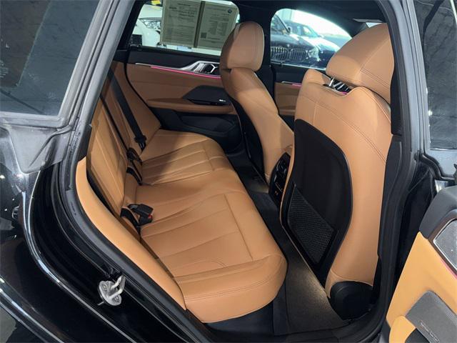 Photo of 2024 Black Sapphire Metallic BMW i4 Gran Coupe