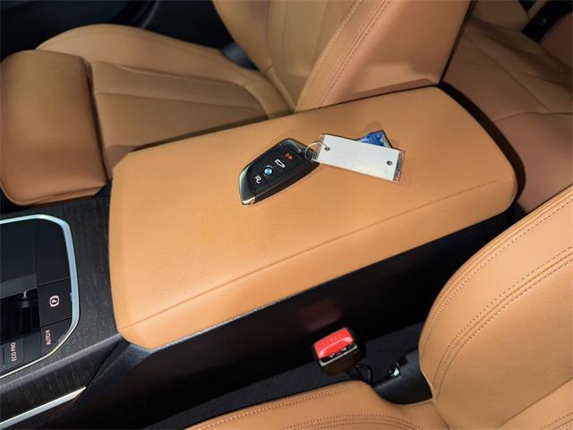 Photo of 2024 Black Sapphire Metallic BMW i4 Gran Coupe