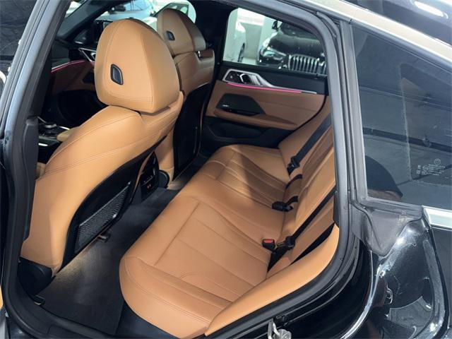 Photo of 2024 Black Sapphire Metallic BMW i4 Gran Coupe