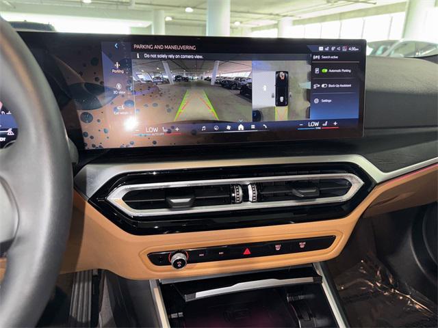 Photo of 2024 Black Sapphire Metallic BMW i4 Gran Coupe