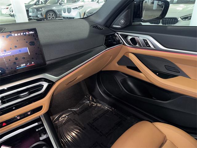 Photo of 2024 Black Sapphire Metallic BMW i4 Gran Coupe