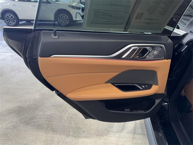 Photo of 2024 Black Sapphire Metallic BMW i4 Gran Coupe