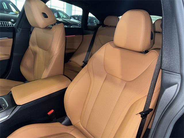 Photo of 2024 Black Sapphire Metallic BMW i4 Gran Coupe