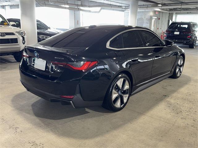 Photo of 2024 Black Sapphire Metallic BMW i4 Gran Coupe
