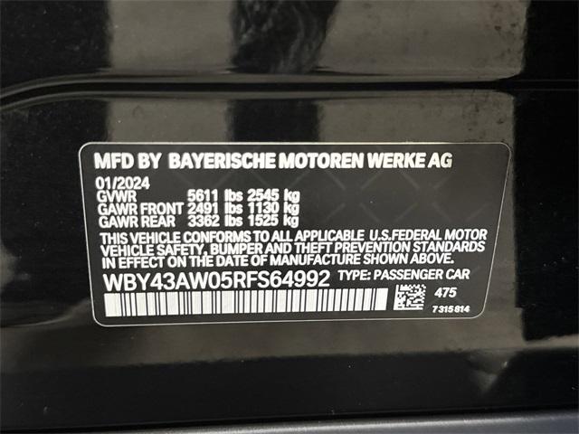 Photo of 2024 Black Sapphire Metallic BMW i4 Gran Coupe