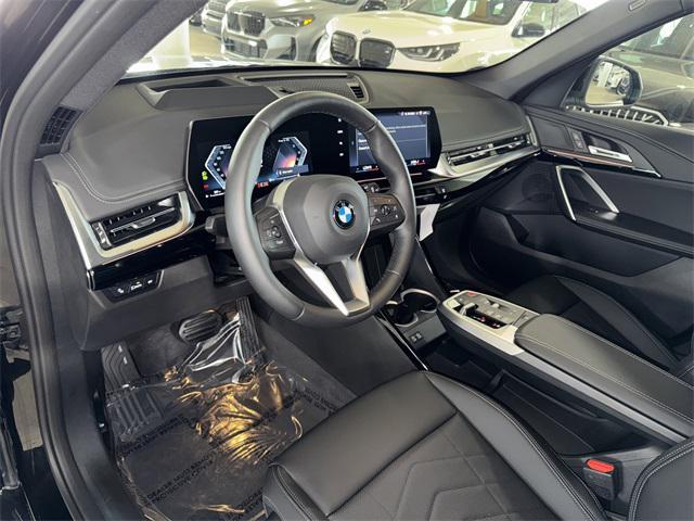 Photo of 2026 Black Sapphire Metallic BMW X1