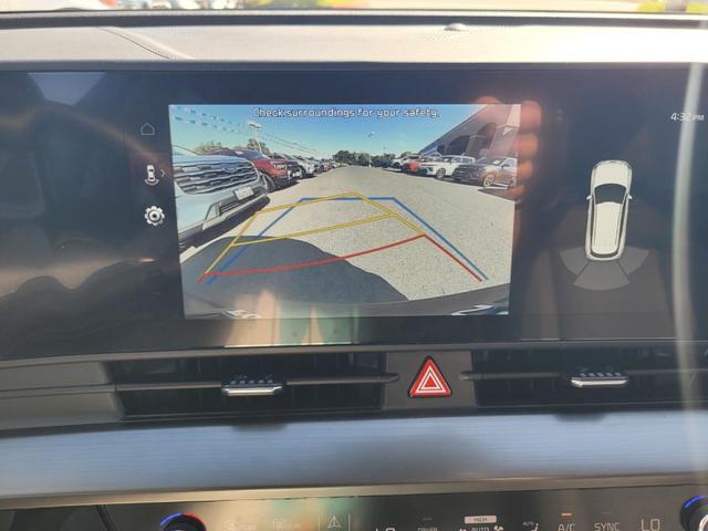 Photo of 2025 Gravity Gray Kia Sportage Hybrid