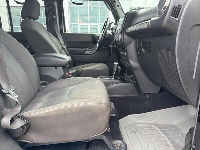 Photo of 2017 Black Clearcoat Jeep Wrangler Unlimited