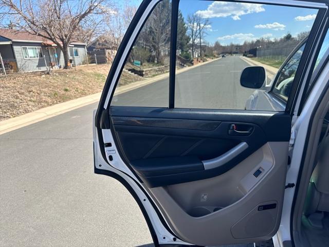Photo of 2003 Natural White Toyota 4Runner