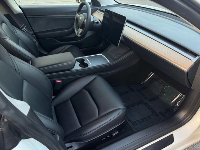 Photo of 2021 Pearl White Multi-Coat Tesla Model 3