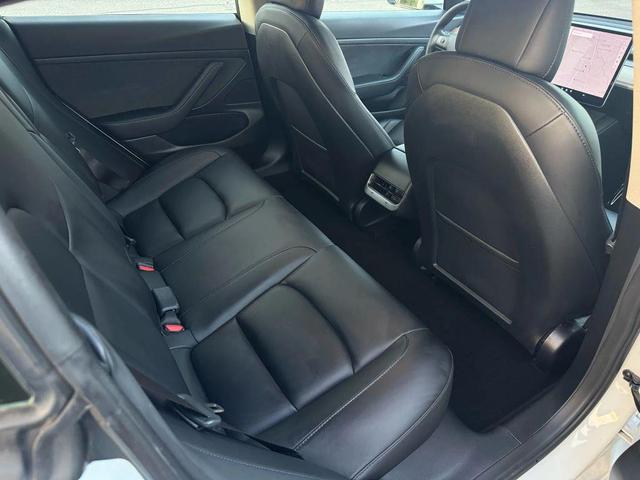 Photo of 2021 Pearl White Multi-Coat Tesla Model 3