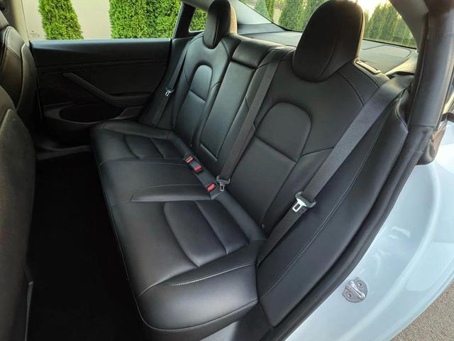 Photo of 2021 Pearl White Multi-Coat Tesla Model 3