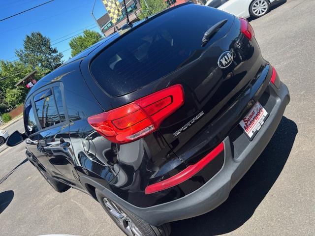 Photo of 2015 black Kia Sportage