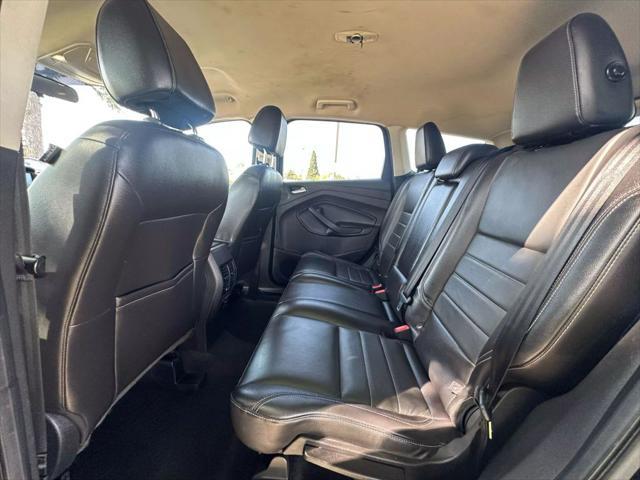 Photo of 2016 Shadow Black Ford Escape