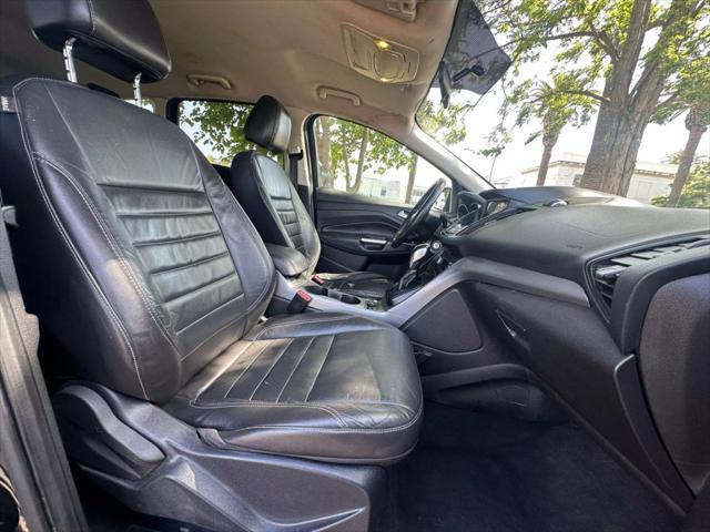 Photo of 2016 Shadow Black Ford Escape