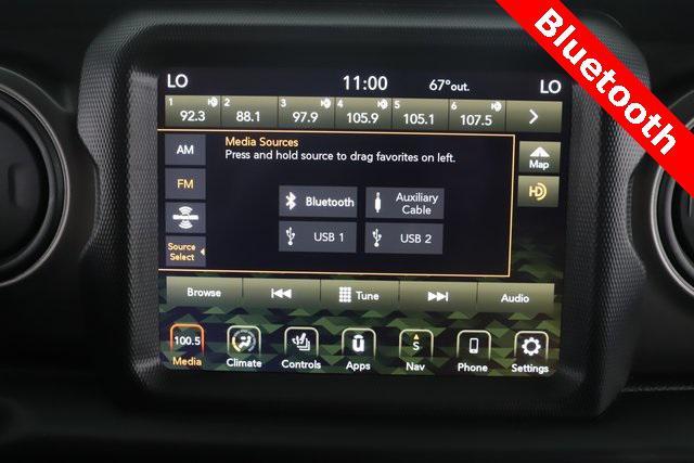 Photo of 2022 Snazzberry Pearlcoat Jeep Wrangler