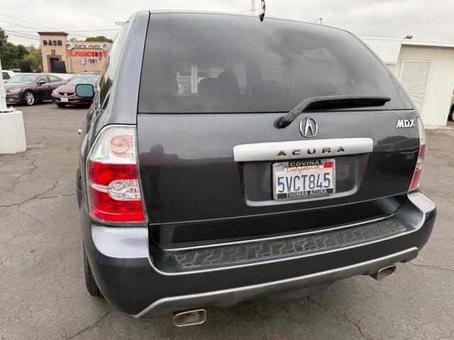 Photo of 2006 Lt. Blue Acura MDX