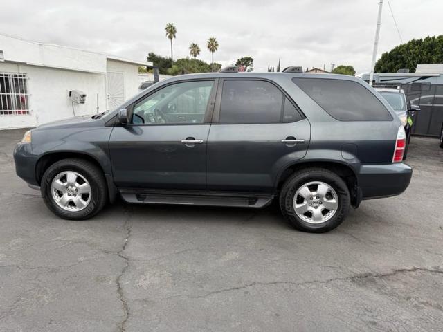 Photo of 2006 Lt. Blue Acura MDX