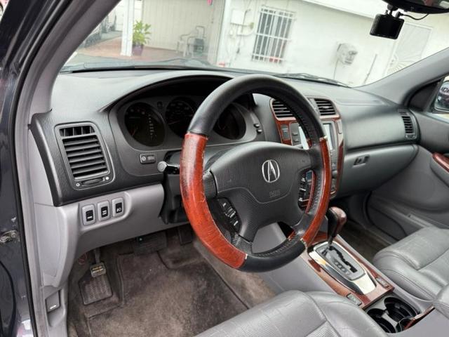 Photo of 2006 Lt. Blue Acura MDX