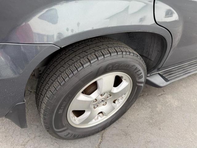 Photo of 2006 Lt. Blue Acura MDX
