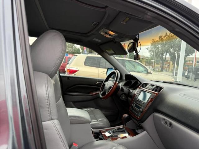 Photo of 2006 Lt. Blue Acura MDX