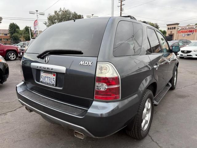 Photo of 2006 Lt. Blue Acura MDX