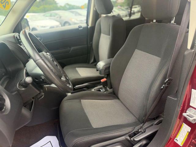 Photo of 2014 Deep Cherry Red Crystal Pearlcoat Jeep Patriot
