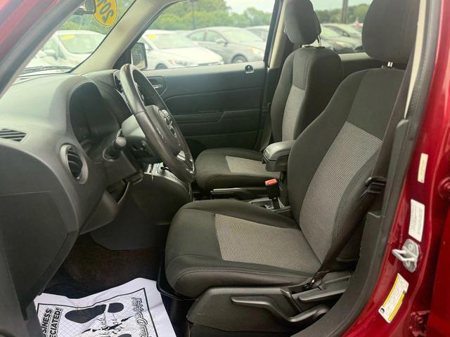 Photo of 2014 Deep Cherry Red Crystal Pearlcoat Jeep Patriot