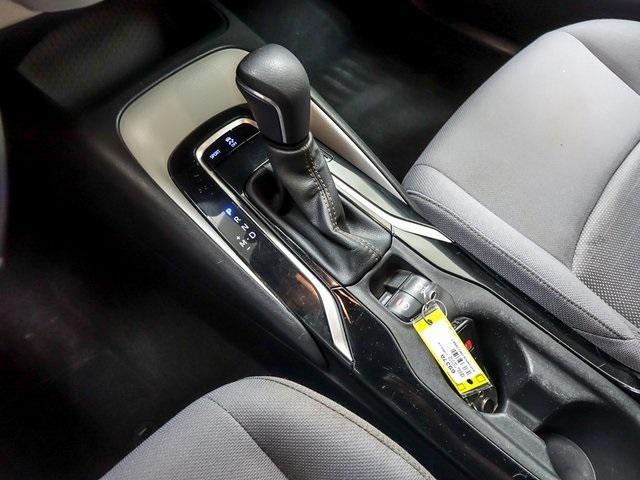 Photo of 2022 White w/Black Sand Pearl Roof Toyota Corolla