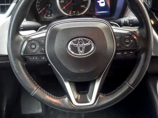 Photo of 2022 White w/Black Sand Pearl Roof Toyota Corolla