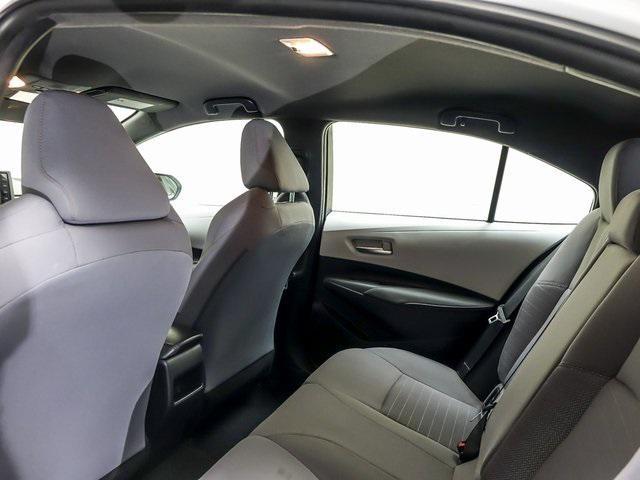 Photo of 2022 White w/Black Sand Pearl Roof Toyota Corolla