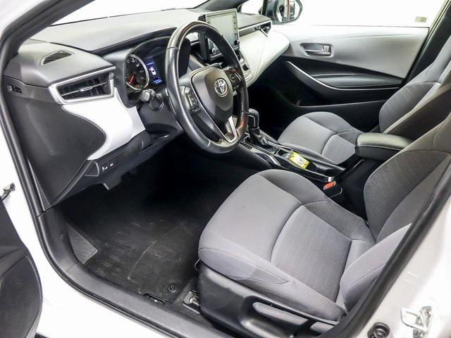 Photo of 2022 White w/Black Sand Pearl Roof Toyota Corolla