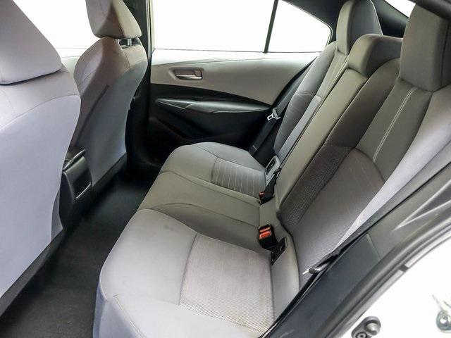 Photo of 2022 White w/Black Sand Pearl Roof Toyota Corolla
